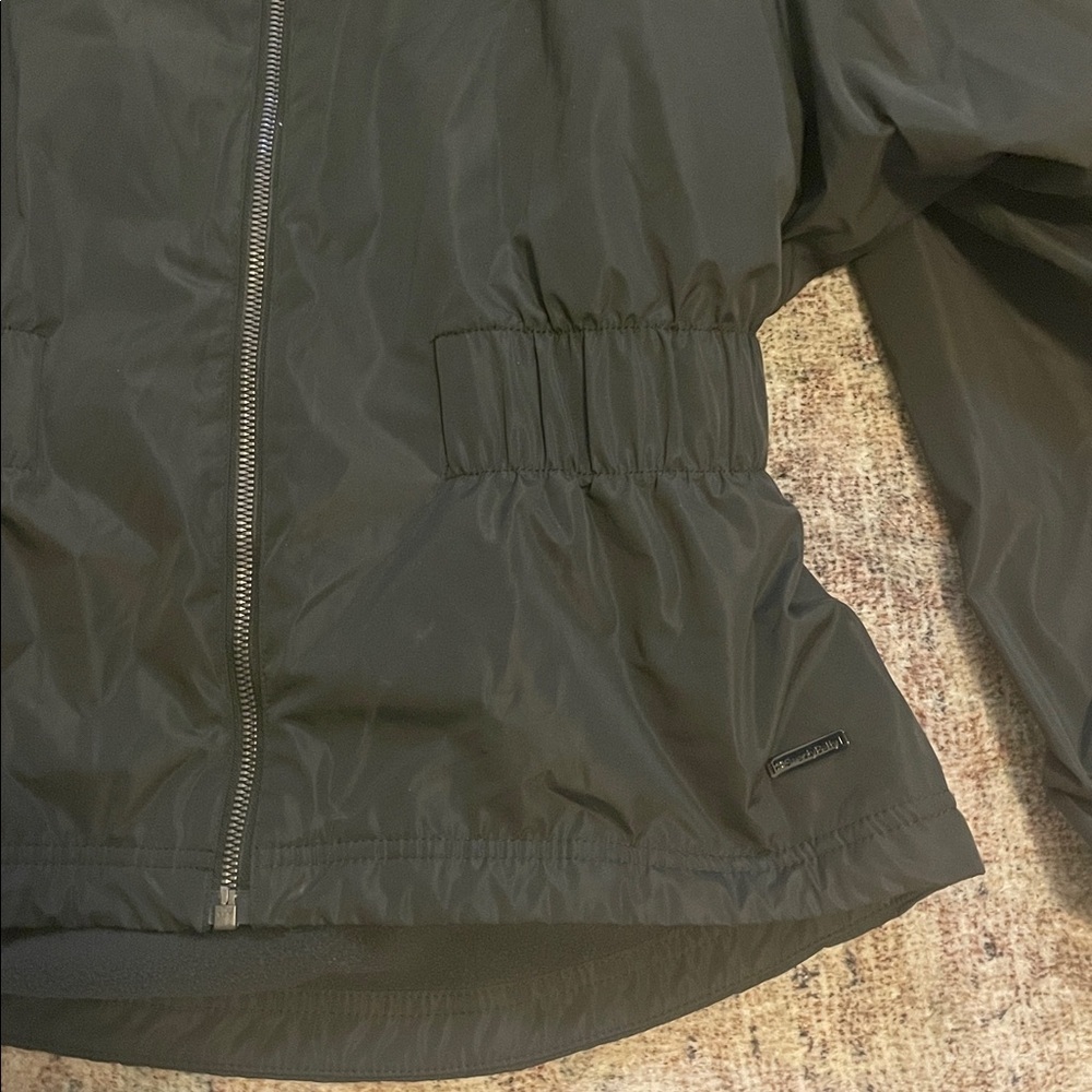 Sweaty Betty Storm Seeker Waterproof Hooded Jacket in Dark Green - Picture 7 of 9